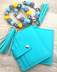Baseball and softball themed wristlet with wallet and keychain in teal