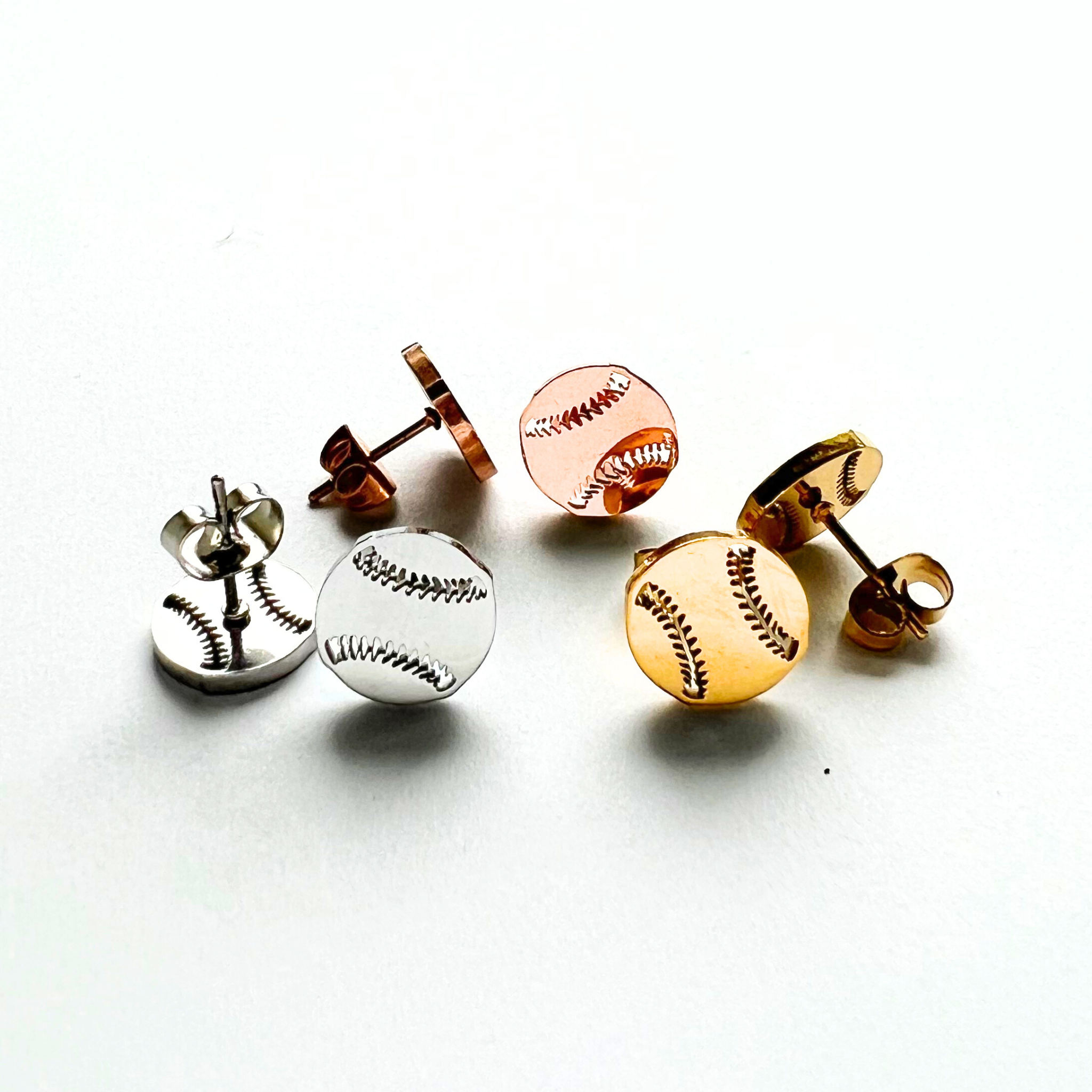 Cute minimalist baseball stud earrings in gold, silver and rose gold. Softball stud earrings in gold, silver and rose gold