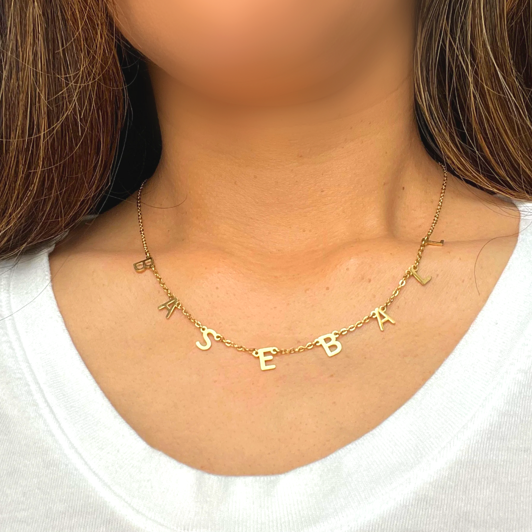 Baseball Necklace product picture. The baseball necklace mockup picture worn by a woman 2