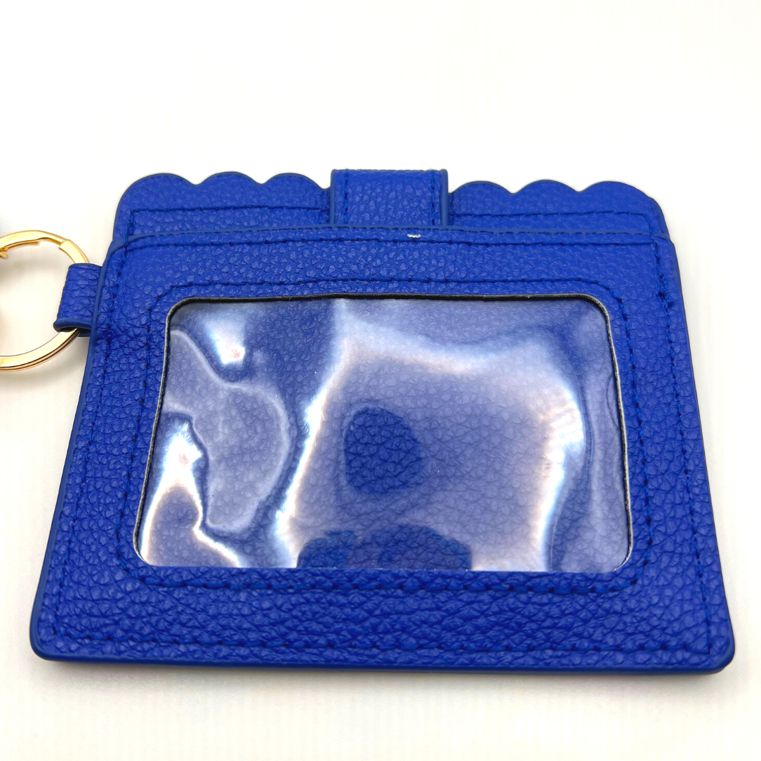 Baseball and softball themed wristlet wallet closeup picture from the backside with clear card holder