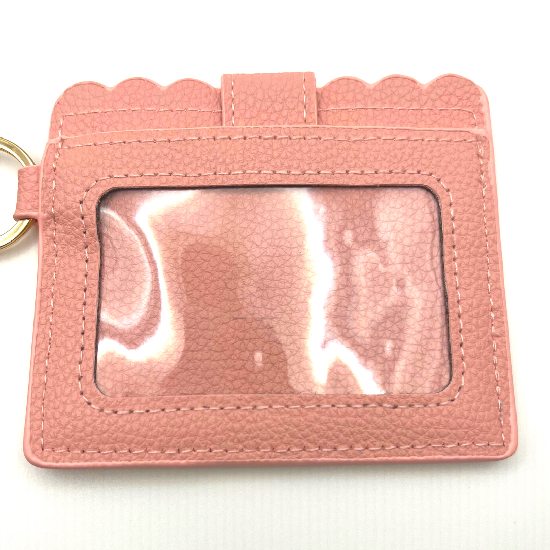 Baseball and softball themed wristlet wallet closeup picture from the backside with clear card holder