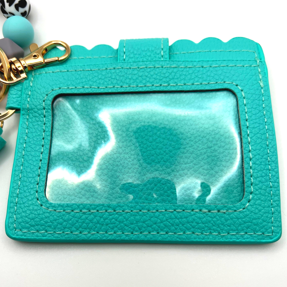 Baseball and softball themed wristlet wallet closeup picture from the backside with clear card holder