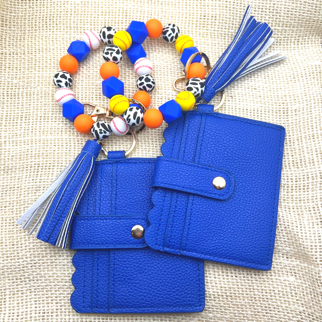 Baseball and softball themed wristlet with wallet and keychain in orange and blue