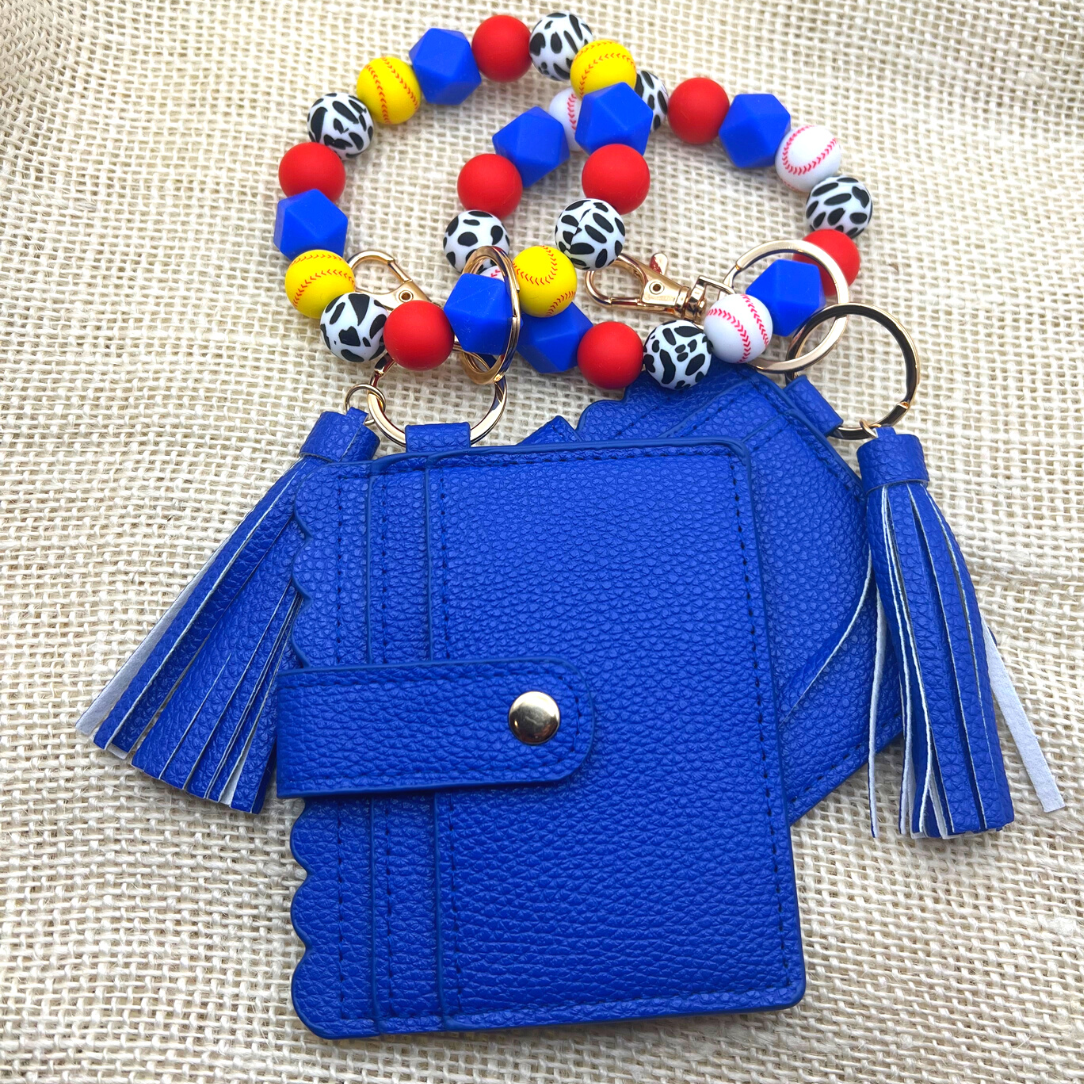 Baseball and softball themed wristlet with wallet and keychain in red and blue