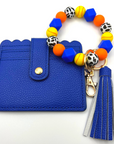 Softball themed wristlet with wallet and keychain in orange and blue